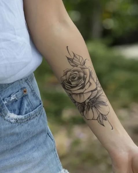 bras tatouage femme rose